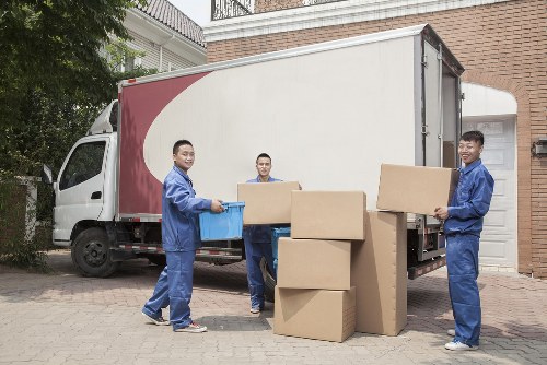 Furniture removals team working in a Pimlico residential street