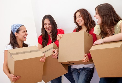 Packing and moving items during a Pimlico van service job