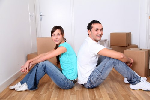 Packed office furniture and equipment prepared for a Pimlico business move