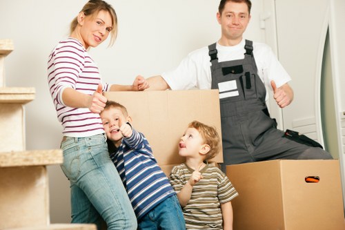 Careful unloading of student boxes and furniture at a Pimlico property